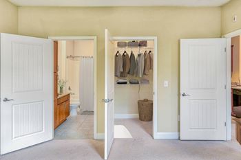 A room with a white door and a white wall at The Lofts at Reynolds Village Apartments, Asheville 92627